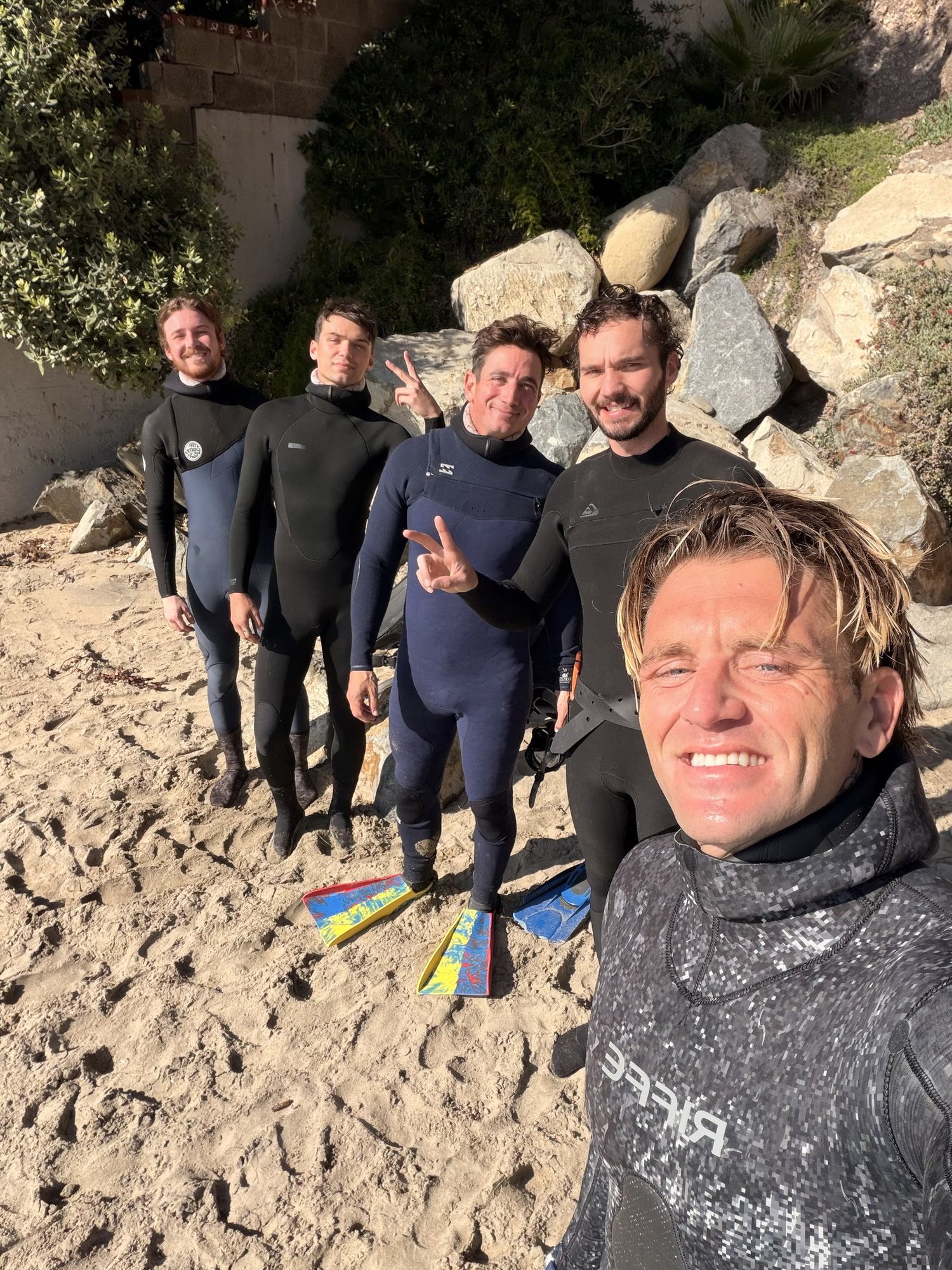 Epic Journey surf crew on the beach