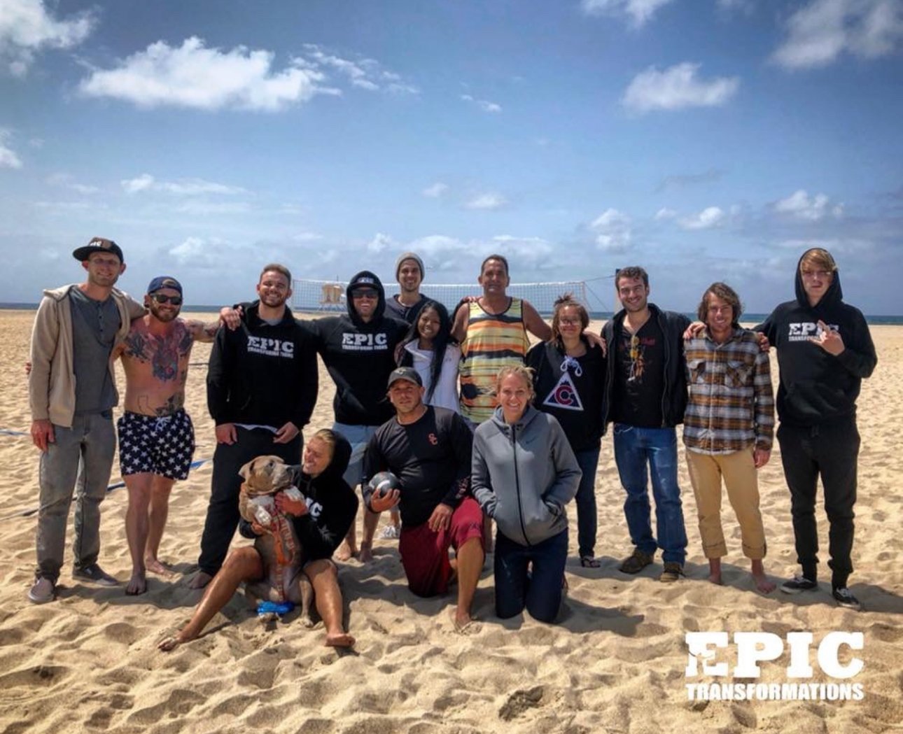Epic Team at the beach with dog