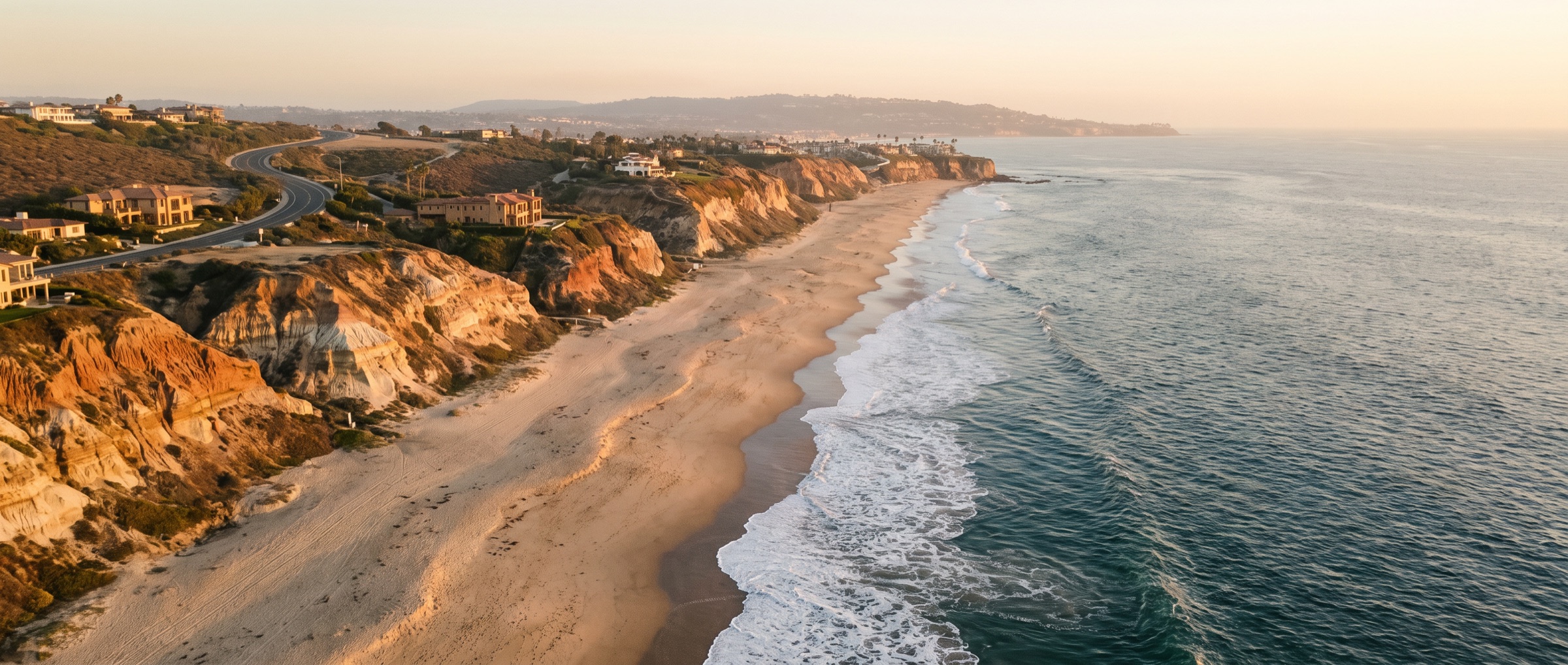 Aerial view of the Orange County coastline at golden hour